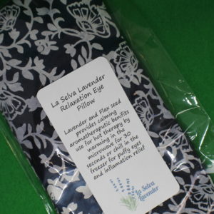 Dark blue eye pillow with floral vines